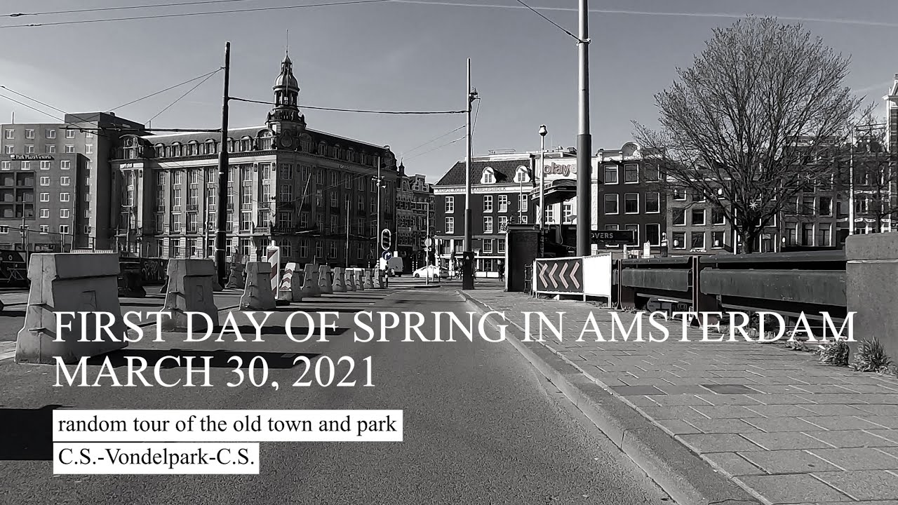 First day of spring in the city of Amsterdam.  Suddenly there are people on the street. 30 Mar 2021