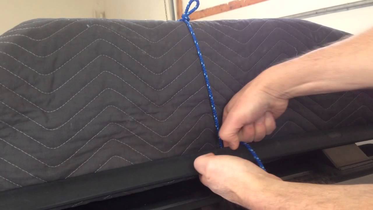 Tying down a load with a modified truckers knot
