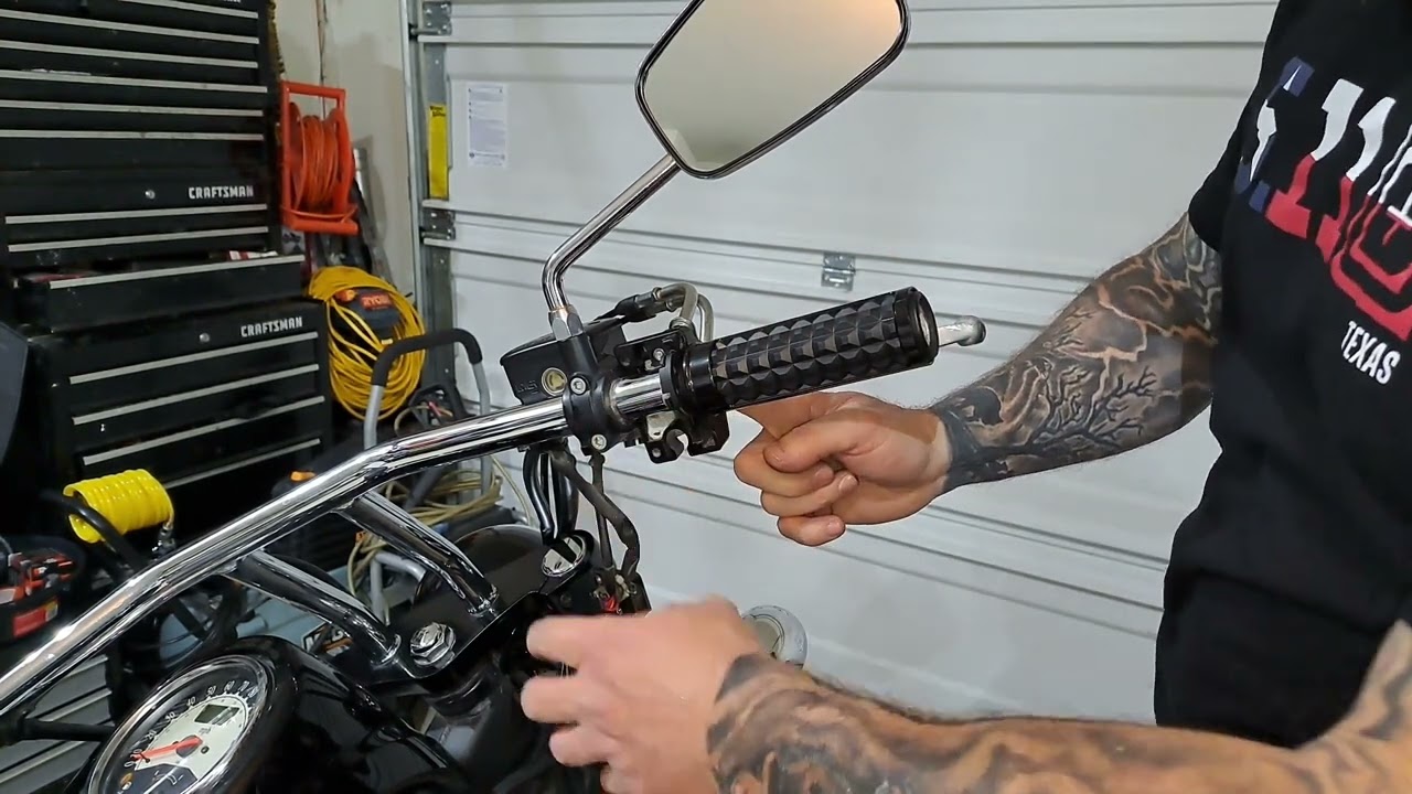 Vulcan 900 custom new grips install.  (Grips are made out of aluminum and ABS plastic)