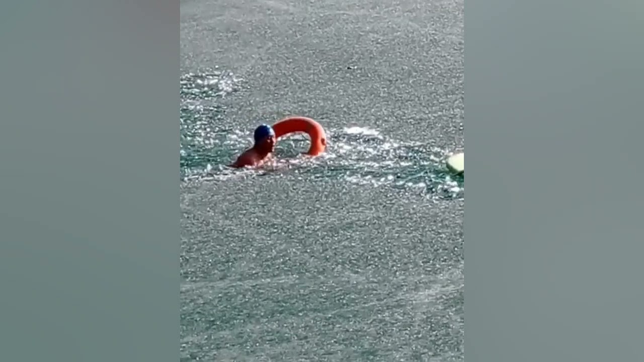 Heroic men break through ice to rescue dog trapped in frozen lake