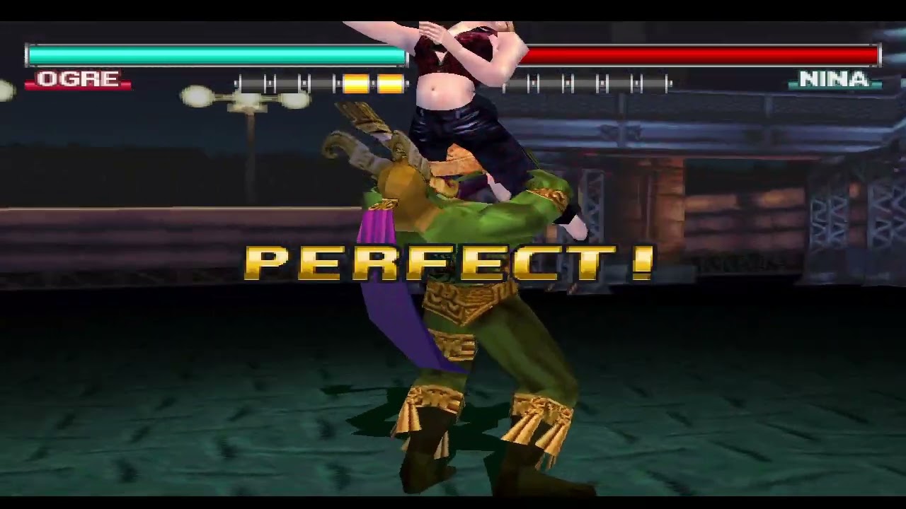 Tekken 3 Ogre bearhugging Nina in her 2nd outfit (red top and black tight pants)
