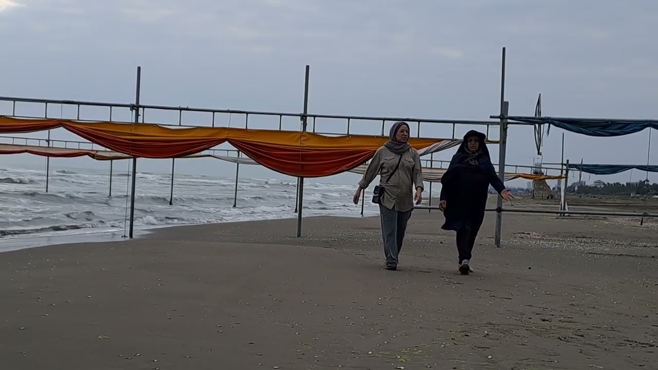 CASPIAN SEA - CLOUDY AND CALM .