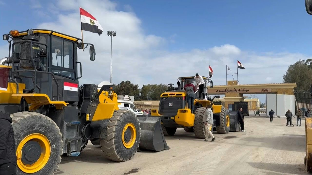 Bulldozers, construction equipment at Rafah crossing waiting to enter Gaza | AFP