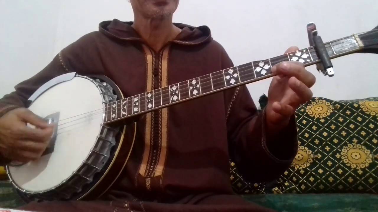 المرحوم الحاج أبنصير والشرح لأغنية لقامة نتزنيت ألغرد إيراكمي