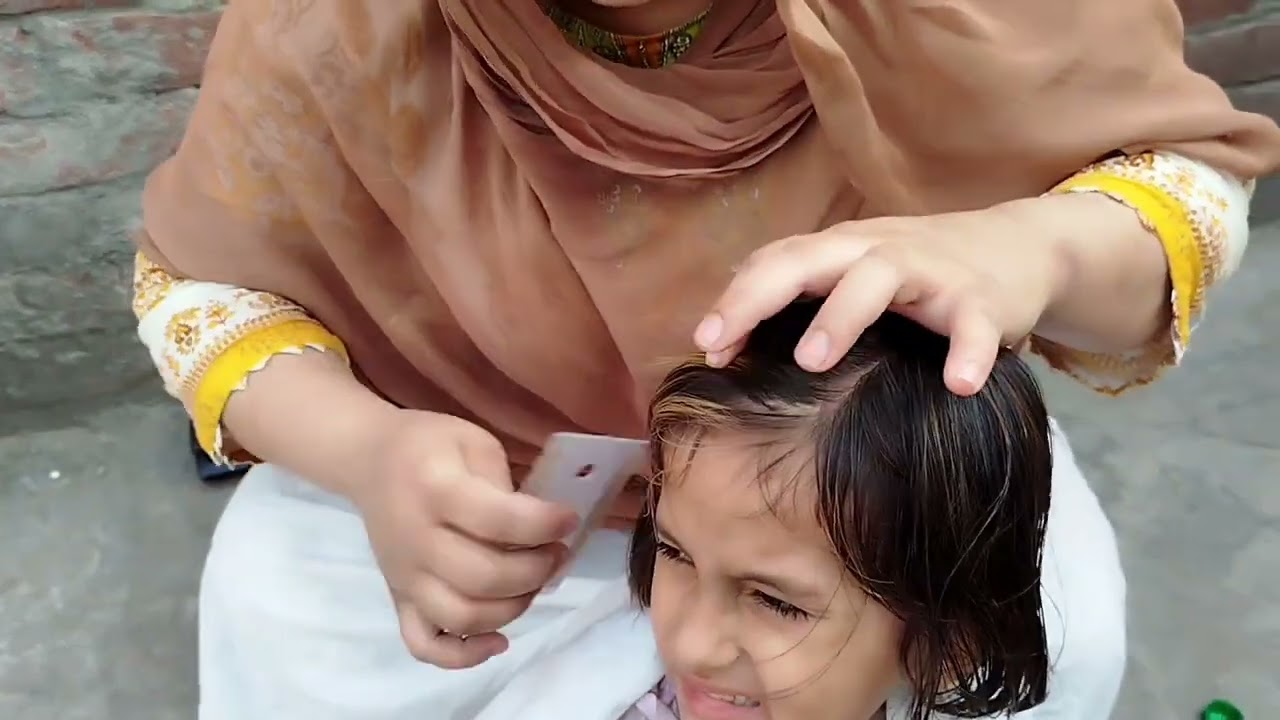 Hair checking of Anaya by mom