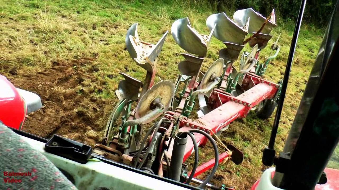 Ploughing with Massey-Ferguson 6480 and Cab View.