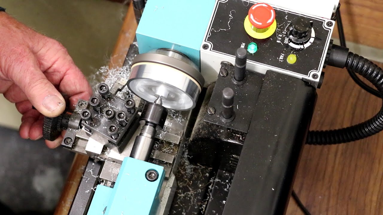 Flywheel Turning on Axminster Co Micro Lathe. Sieg
