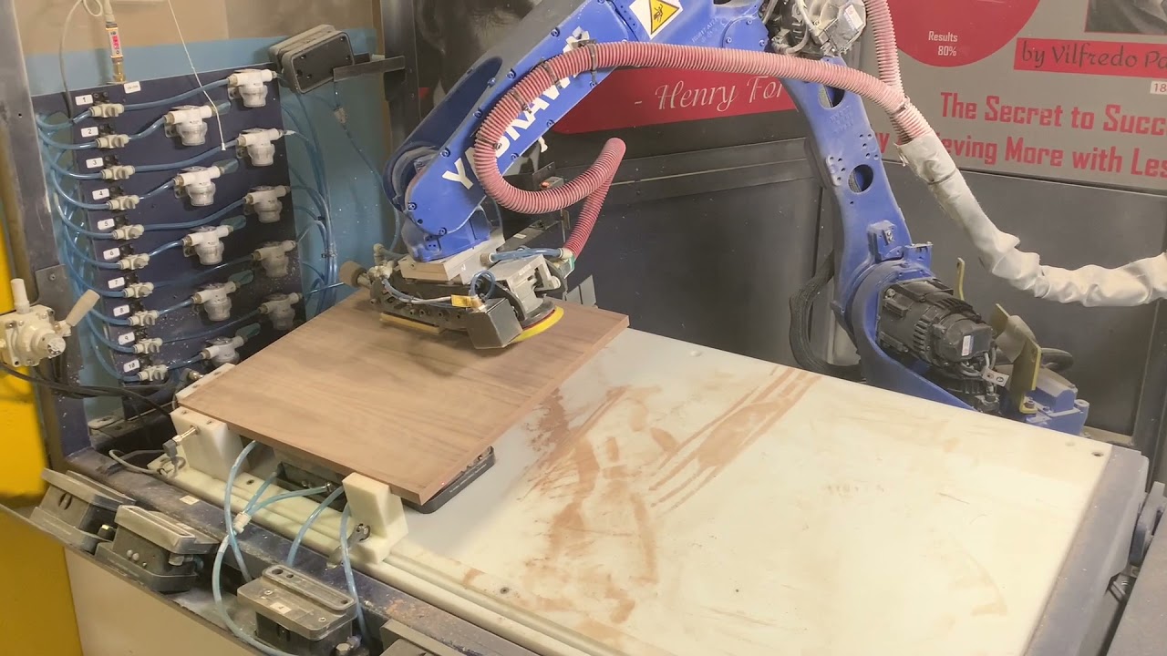 Cosmo the sanding robot on veneer
