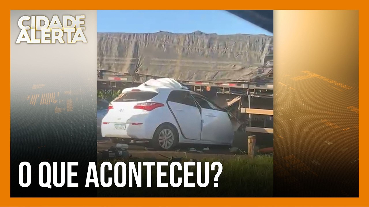 Carro para embaixo de carreta na MGC-452, em Santa Juliana: motorista socorrido vivo