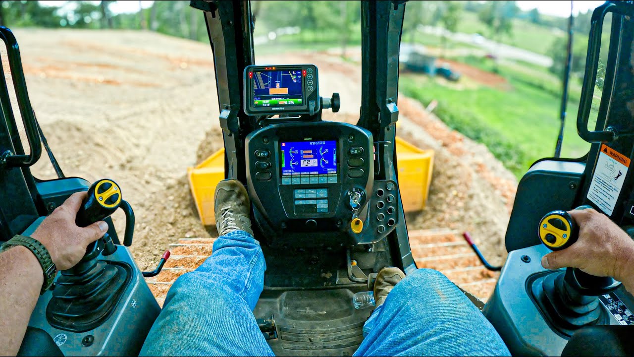 In Cab View of Komatsu D51EXi Dozer Cutting a Mountain