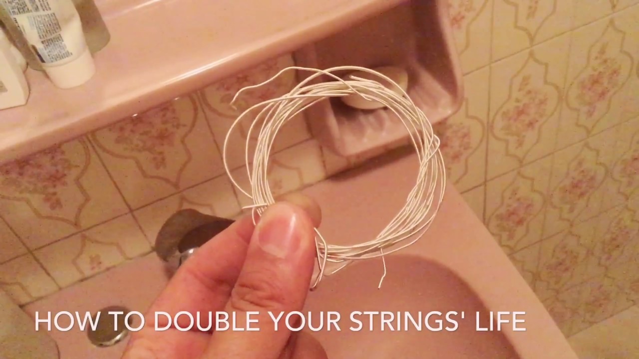How to clean your used classical guitar bass strings - Tariq Harb
