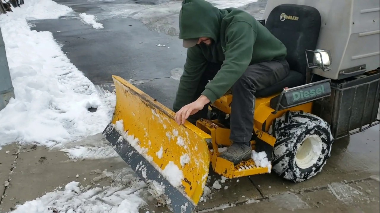 City Sidewalk Snow Cleanup With a MD Walker