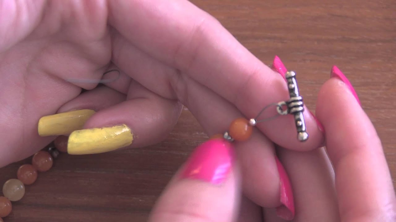 DIY Beaded Charm Bracelet with wire, crimp beads, & clasps ♥ | SoCraftastic