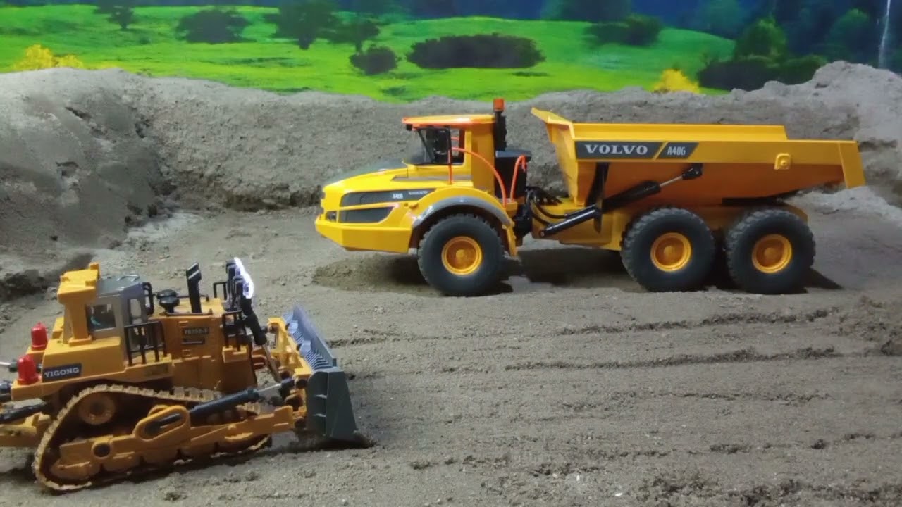 The rc bulldozer is tasked with leveling the land at the mine site.