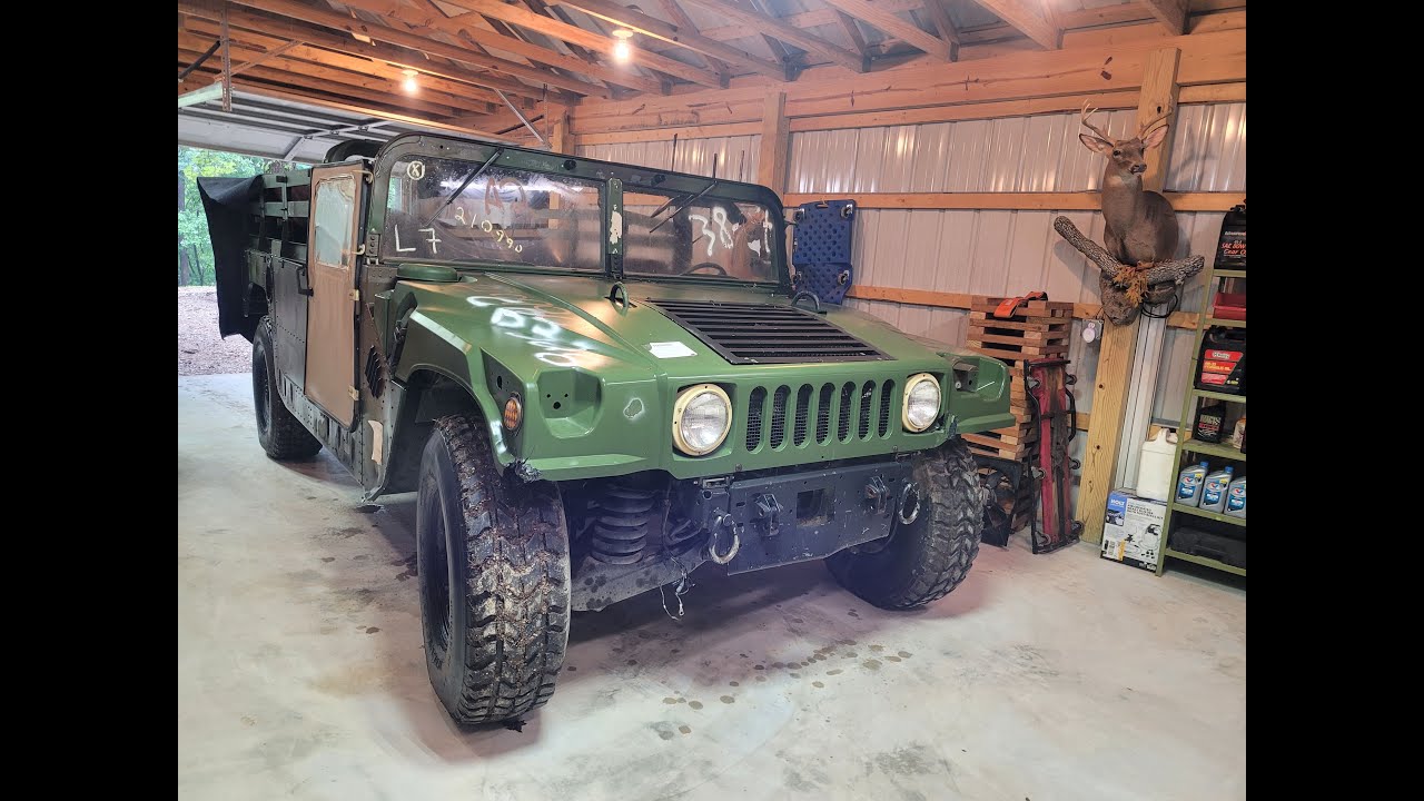 Fixing the brakes on our accidental Humvee.