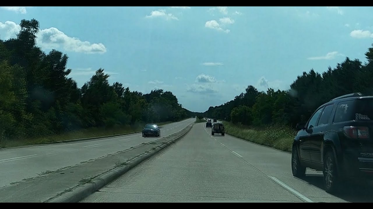Driving On Clay Road Through The Addicks Dam