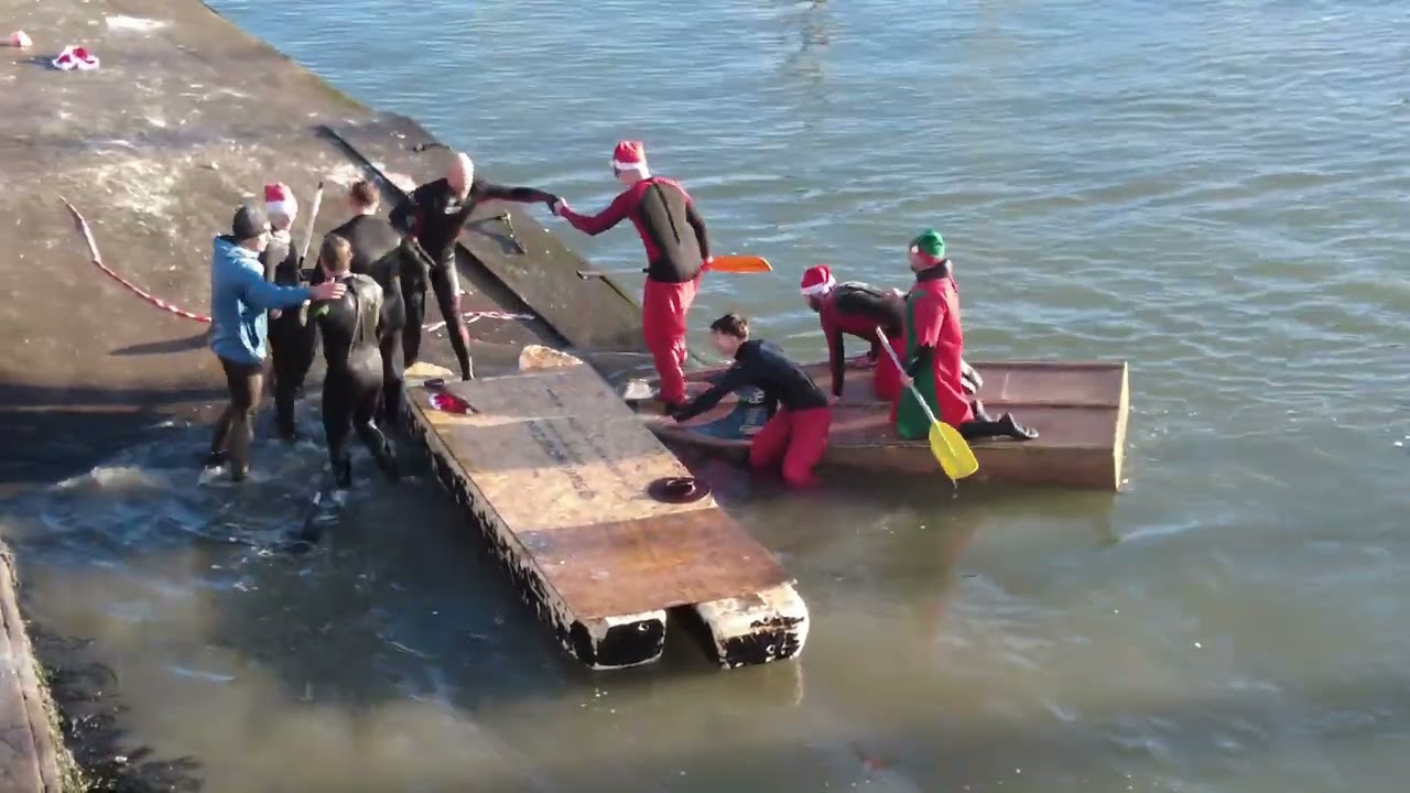Crazy flour fight at Scarborough Harbour during the raft race for Boxing Day.