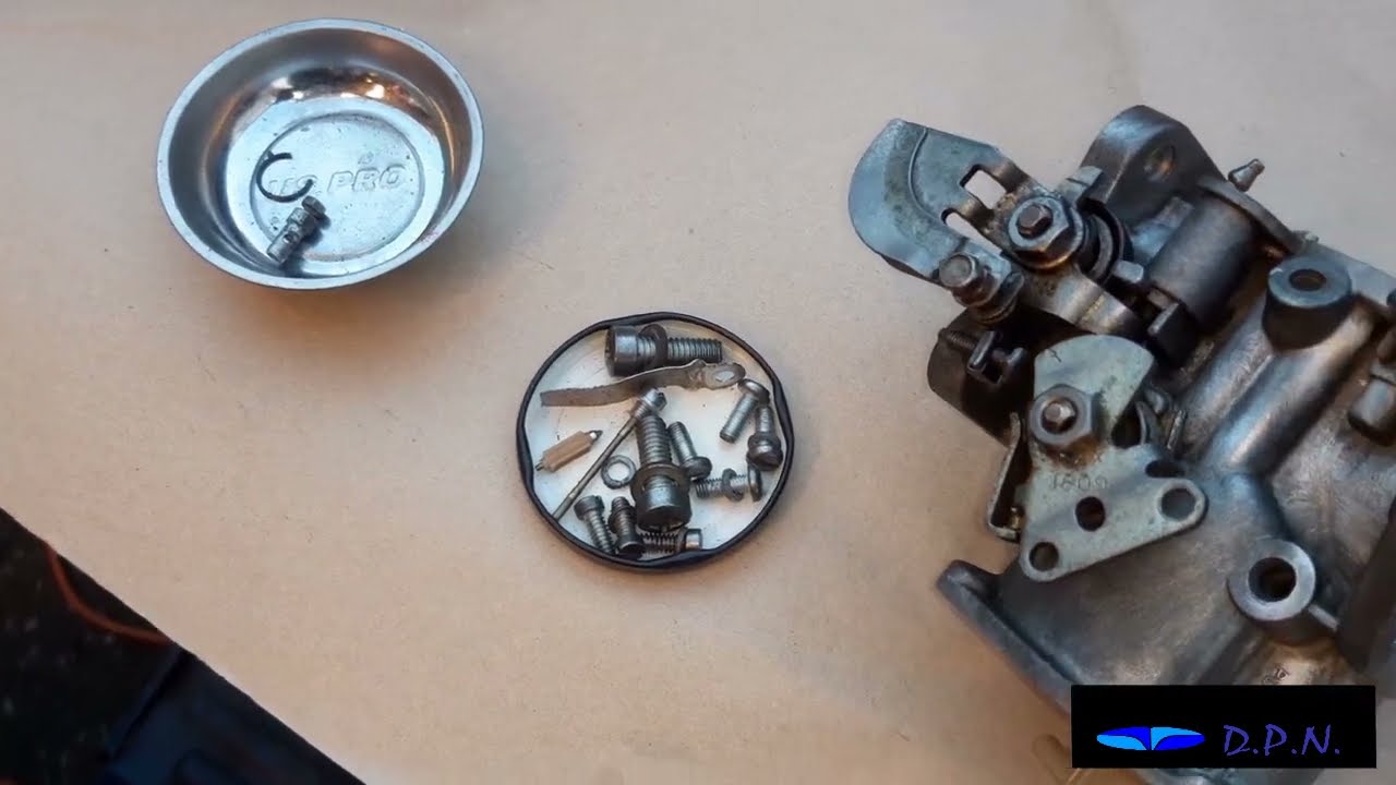 putting back together an SU carburettor from an MG Metro and changing the needle valve and seat