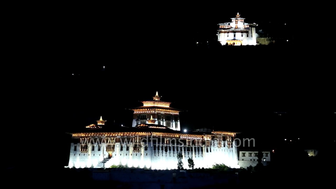 Rinpung and Ta Dzong all lit up in magical evening blue light, Bhutan