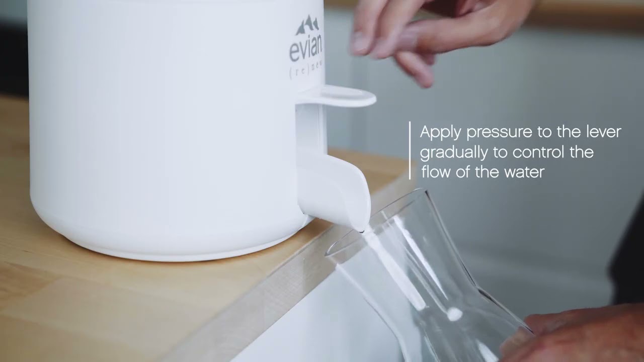 evian (re)new - Pouring evian water in a carafe