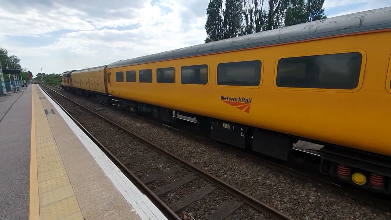 Class 37116 and DBSO coach 9714 working the 5Z24 10.19 service