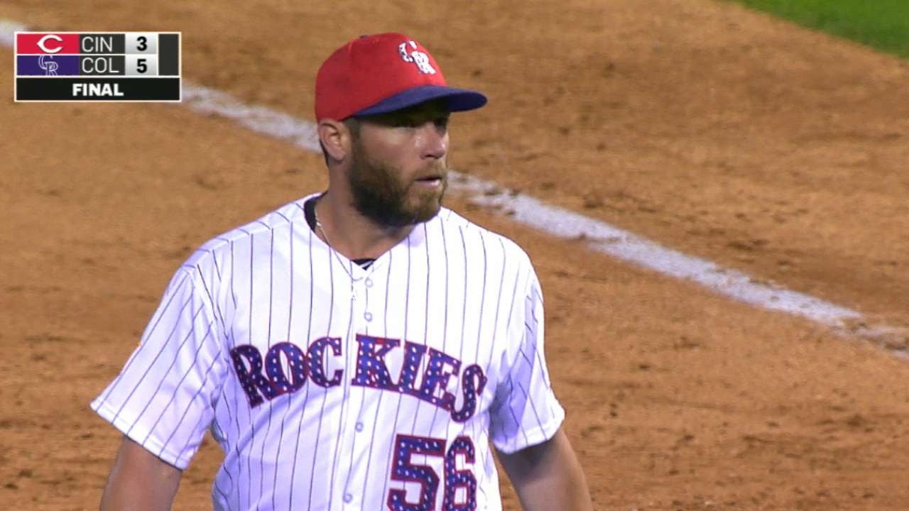 Holland gets 27th save for Rockies' record