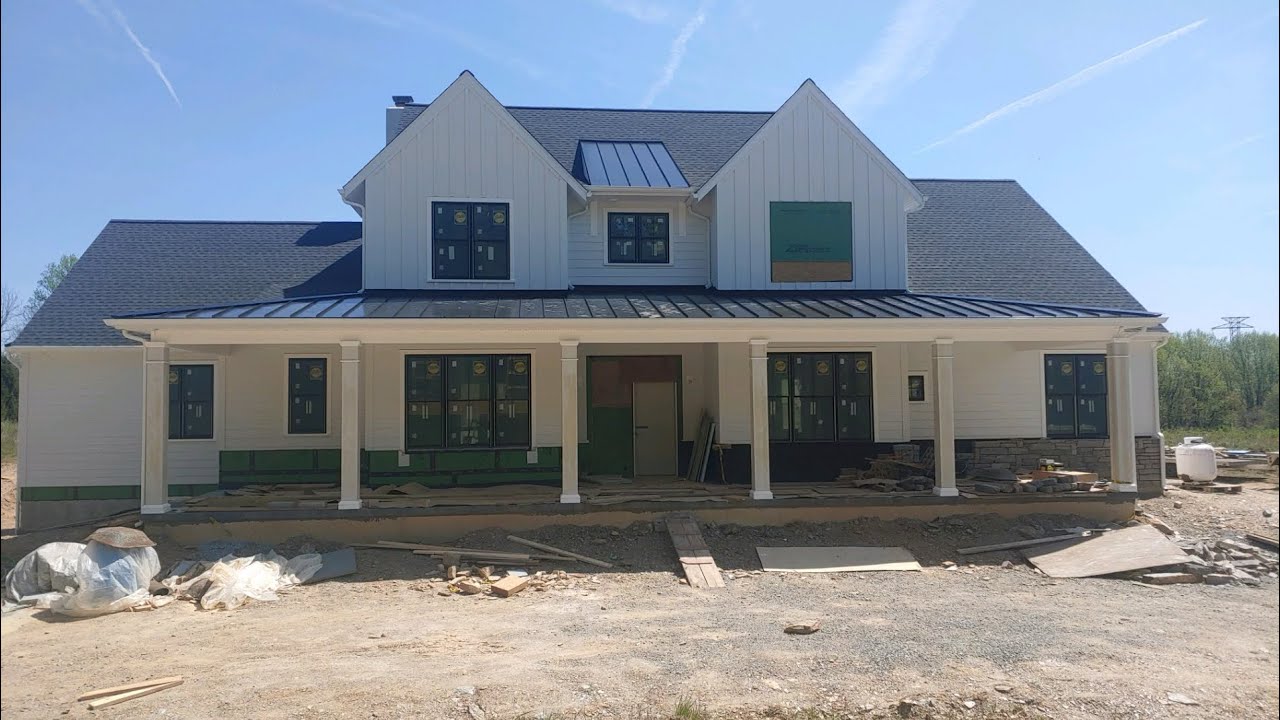 James Hardie Fiber Cement Siding & Black Standing Seam Roof