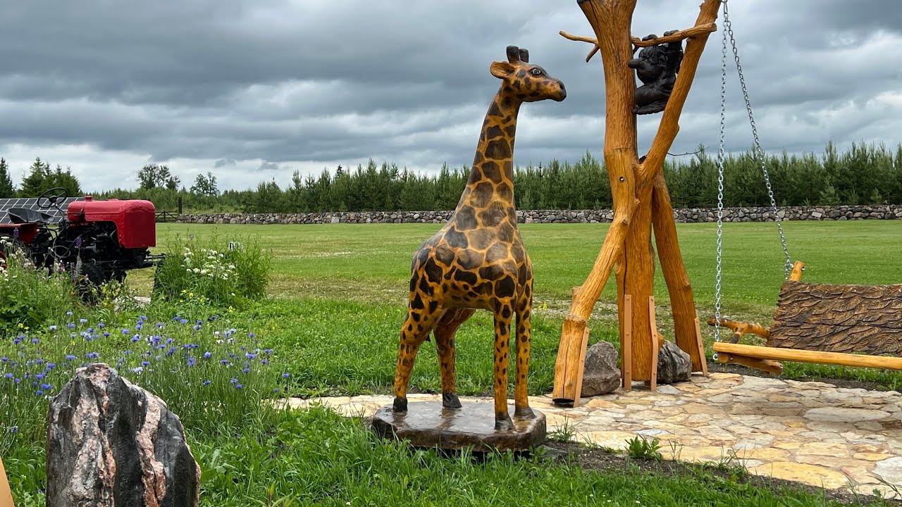 Chainsaw carved wooden giraffe