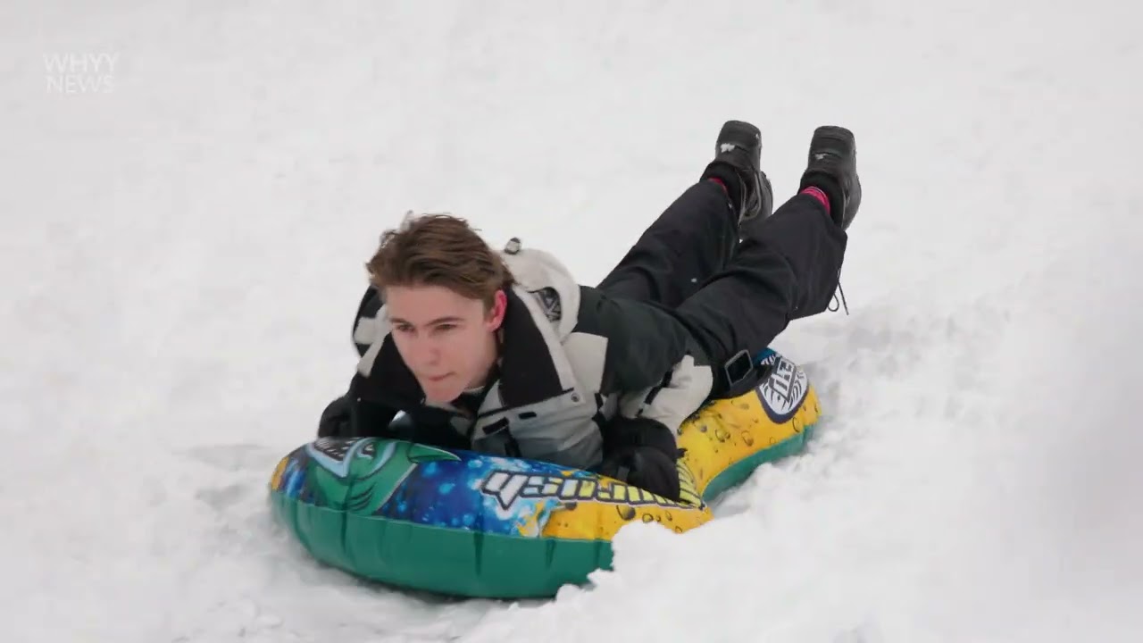 Residents delight in a foot of snow in Philadelphia