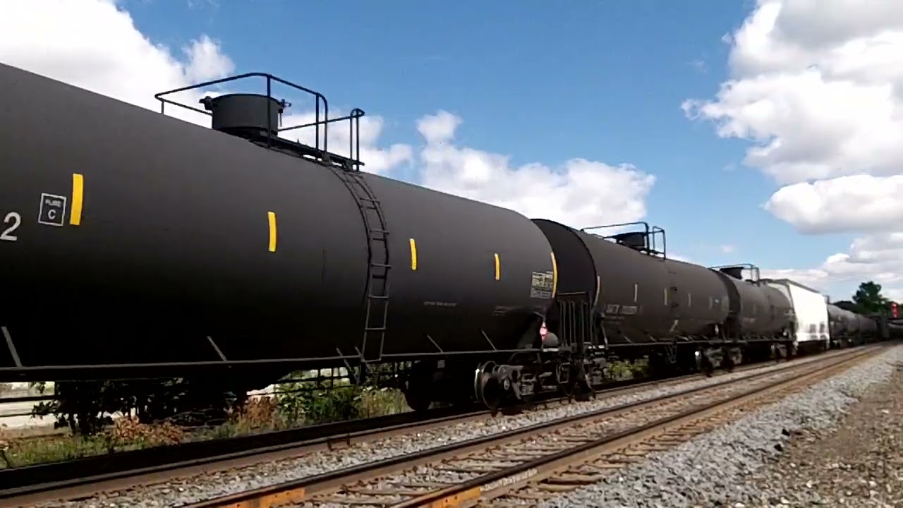 CN 301 w/ CN Engines 3243 & 3979 (ex CREX 1511) lead this long 554 axle, WB Autorack/Mixed Freight