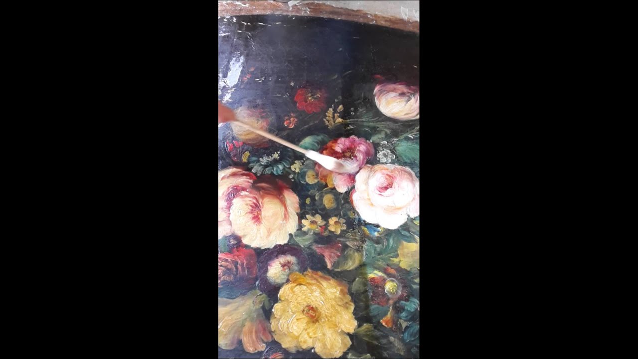 Pulitura di un dipinto antico