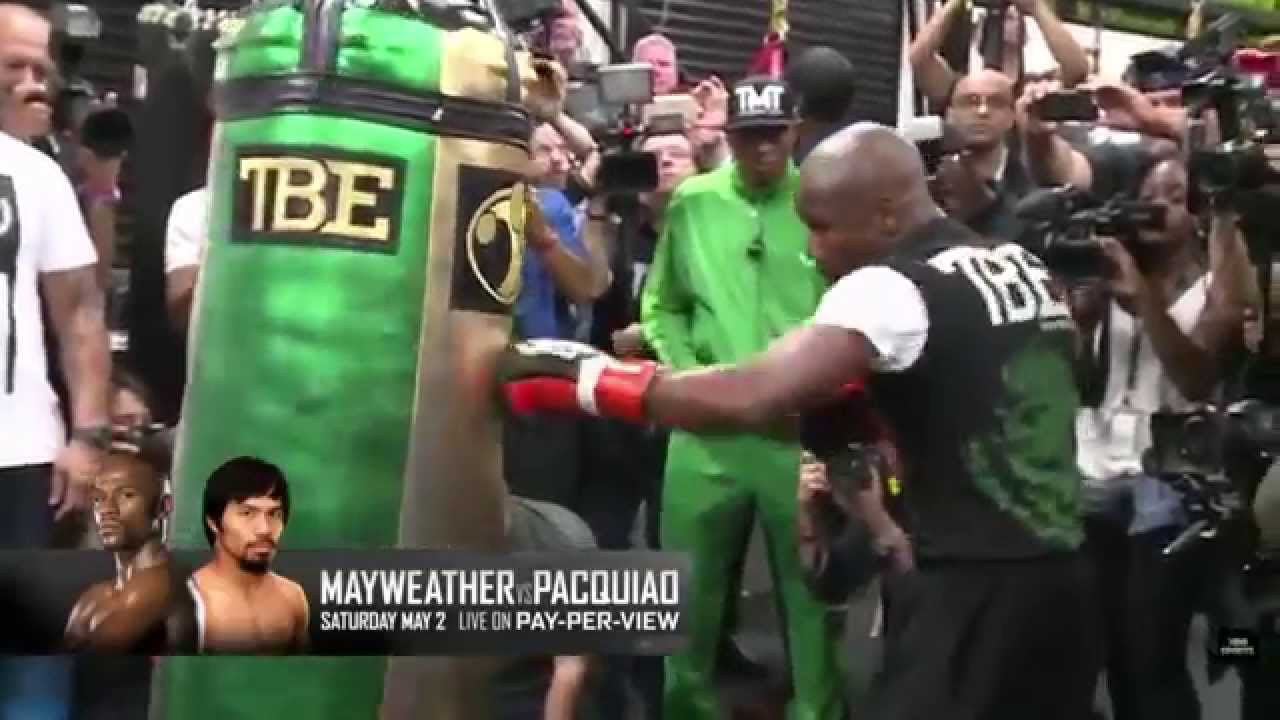 Mayweather switches gloves, moves to the punching bags