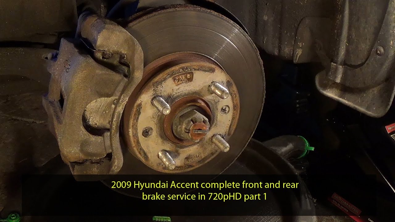 2009 Hyundai Accent complete front and rear brake service in 720pHD part 1