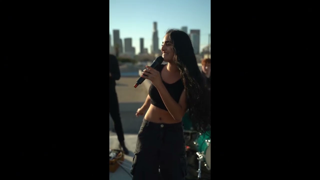 This rooftop performance is pure VIBE! 🔥🎸