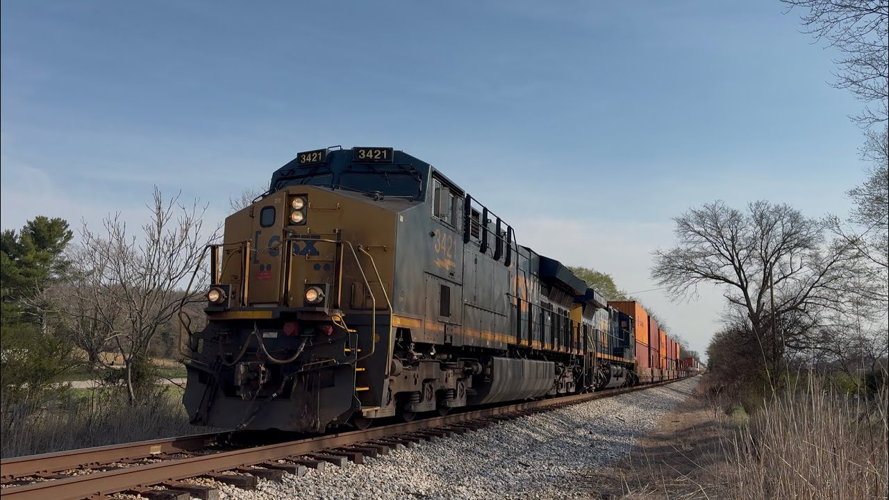 CSX 3421 leads M209 with a friendly engineer at Horse Cave
