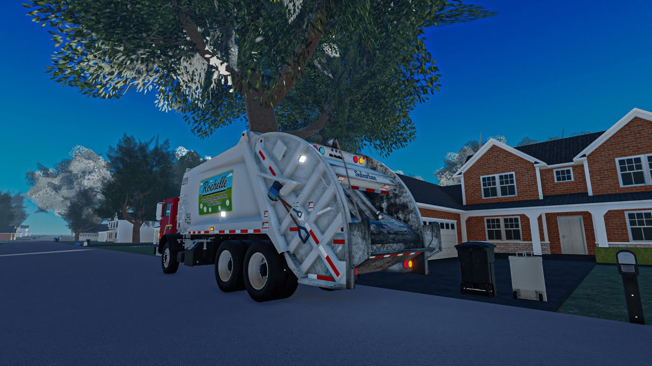 Rochelle Disposal | Mack MR Rear Loader Crushing Garbage