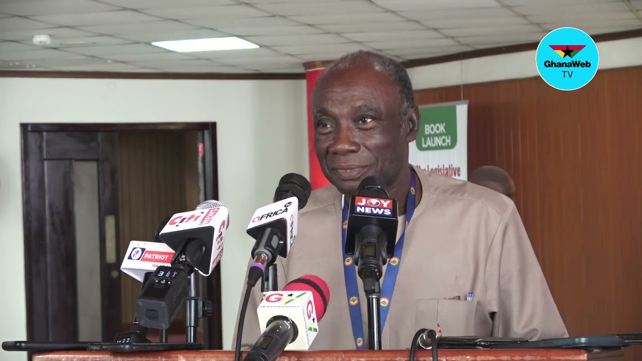 KT Hammond covers face of Dr Donkor during live interview