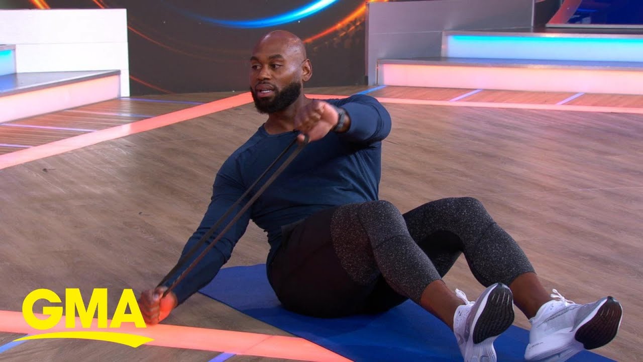 Corey Calliet leads a body band burner workout