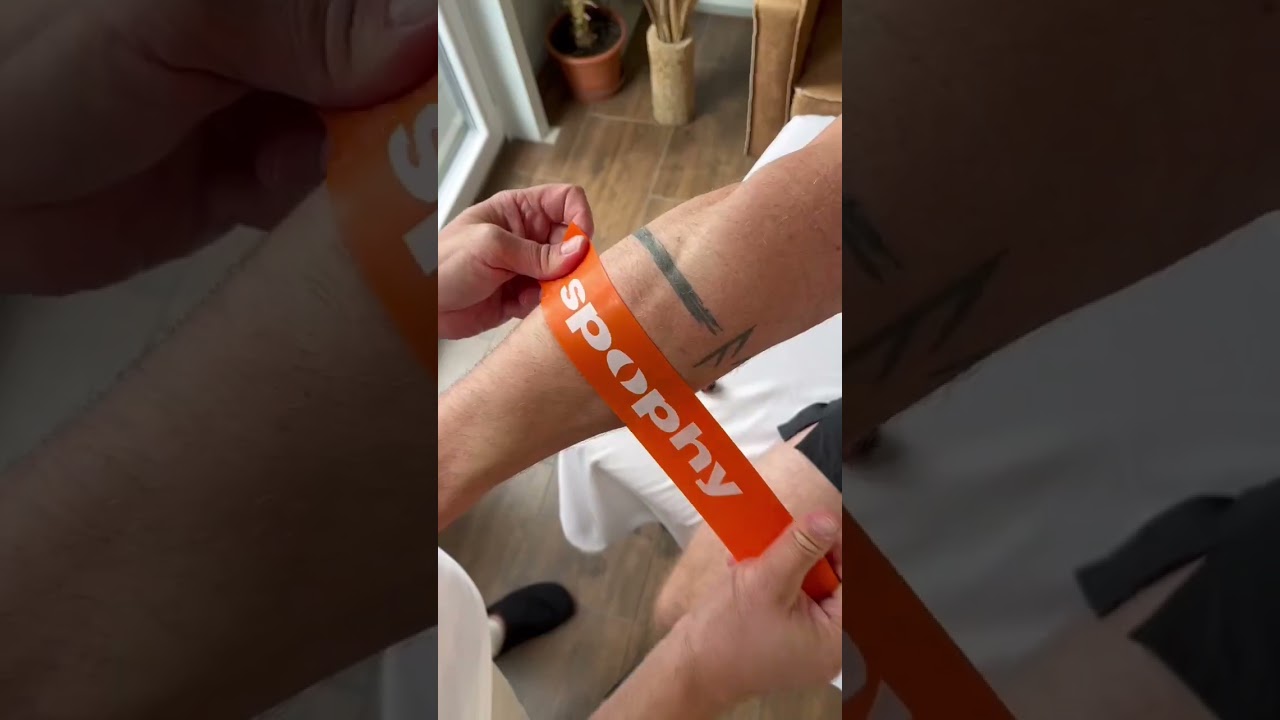 Terapia punkt&oacute;w spustowych na przedramieniu za pomocą Spophy flossband