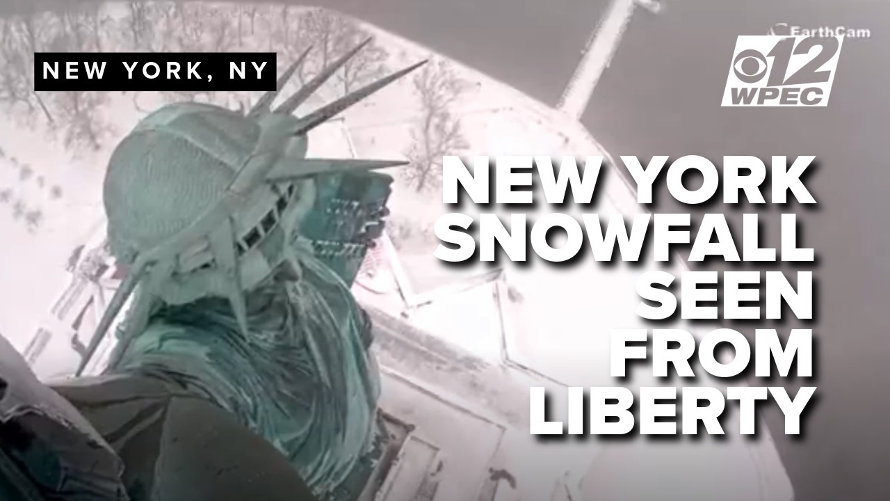 Snow blankets New York, offering a stunning look from the top of the Statue of Liberty