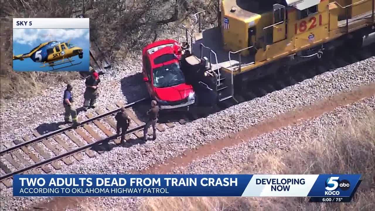 Two dead after car and train collide near Minco