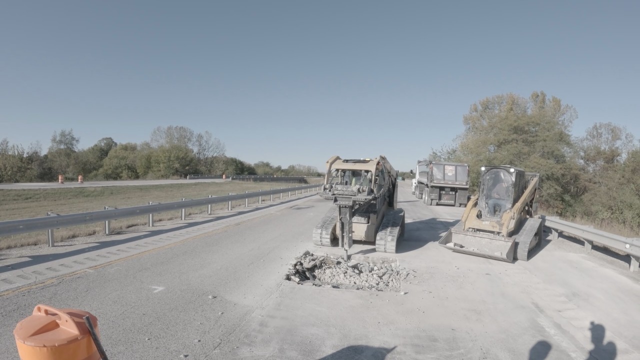 Hammer Breaks Removing Road during Road Construction