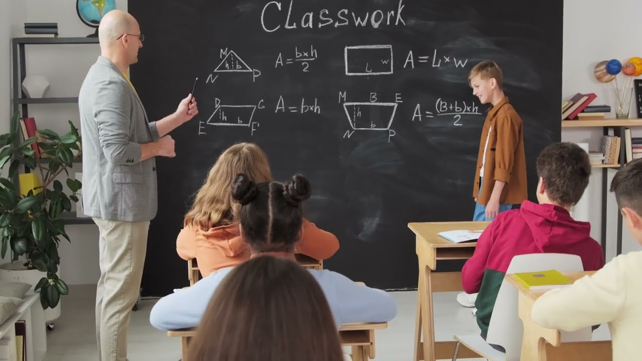 Mathematics Mastery: Teacher Explains Concepts to Engaged Student | 4K Royalty-Free Stock Video