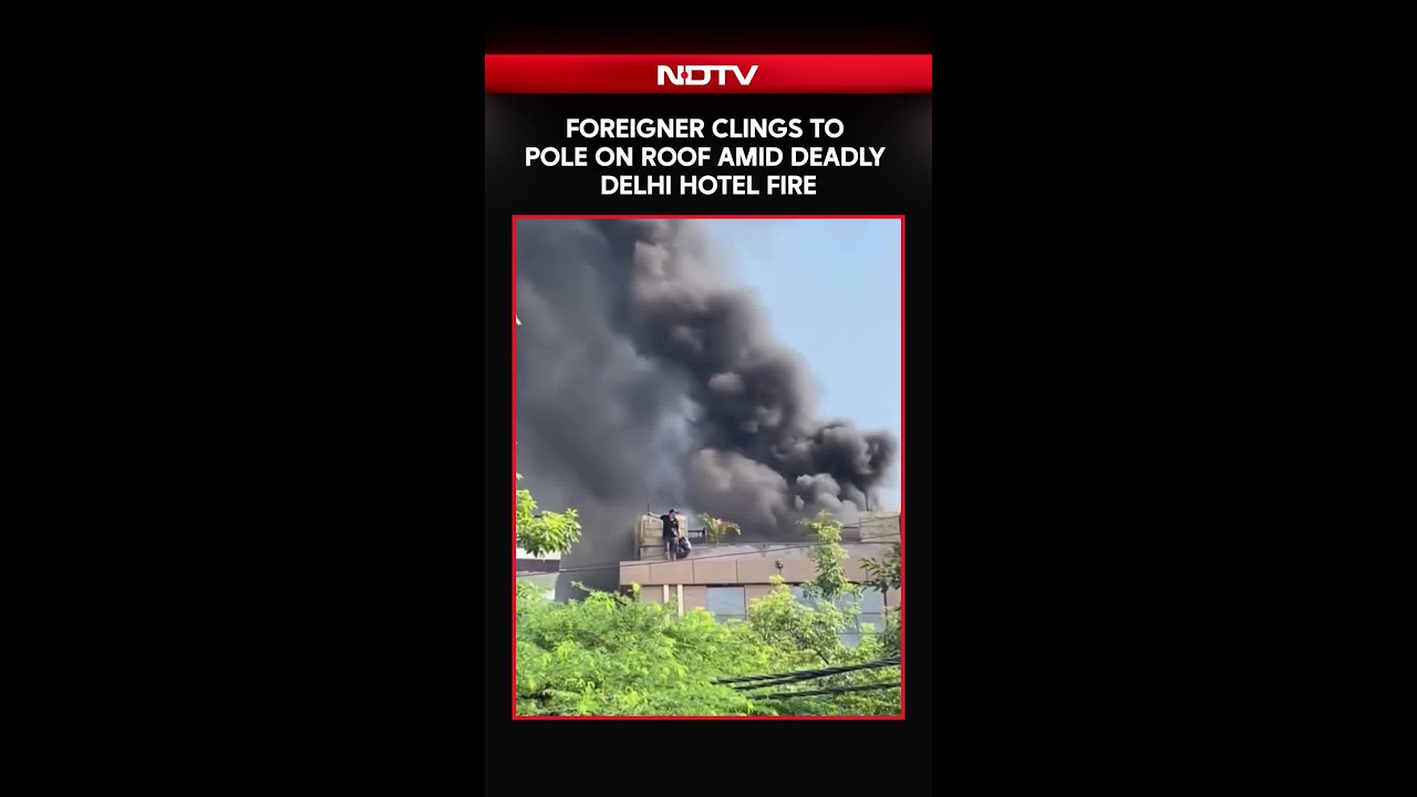 Delhi Fire Tragedy | Foreigner Clings To Pole On Roof Amid Deadly Delhi Hotel Fire