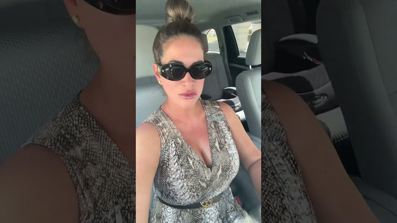 Chic Car Ride: Stylish Woman Poses in Snakeskin Dress#fashion #style #snakeskin