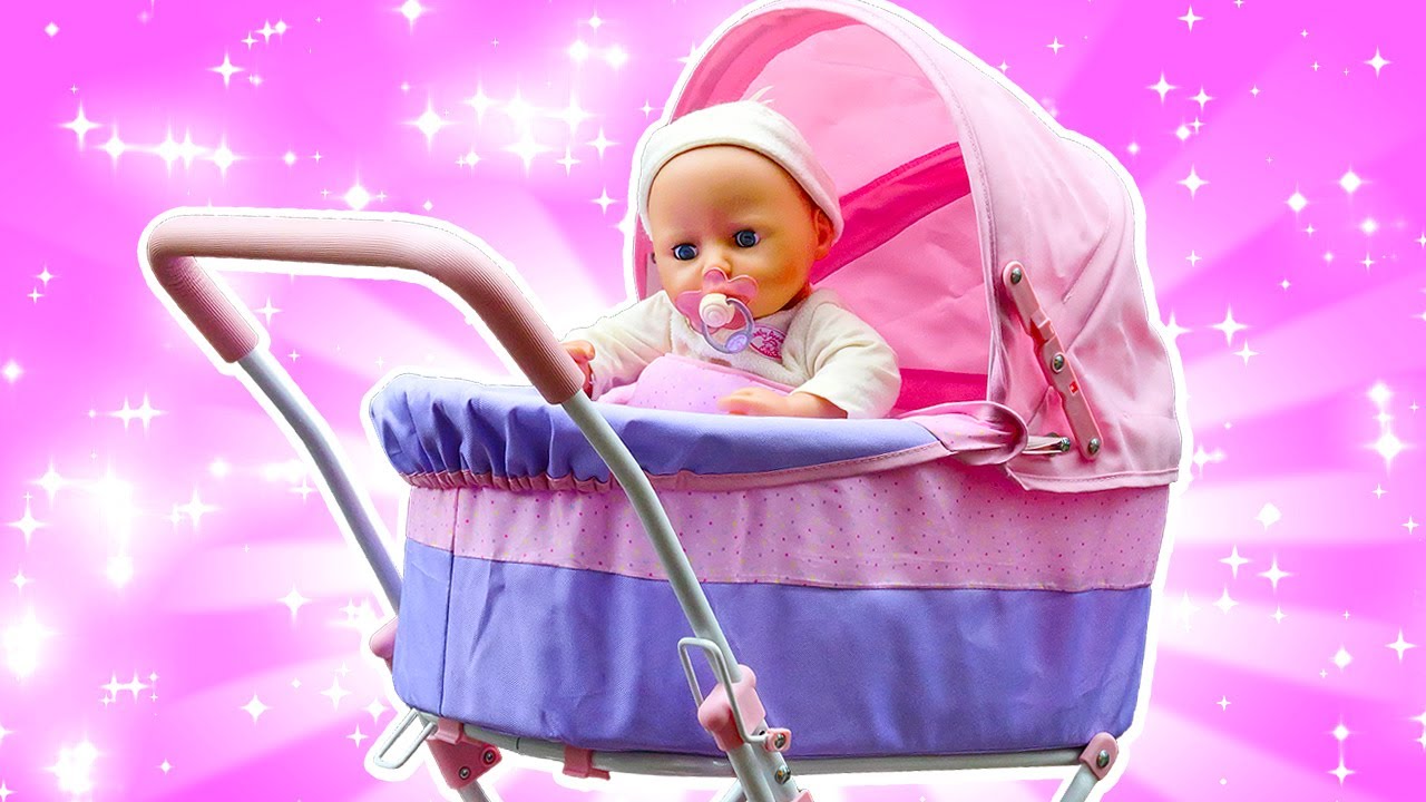 A new pink toy stroller for baby dolls! Baby Annabell doll goes for a walk & on a picnic.