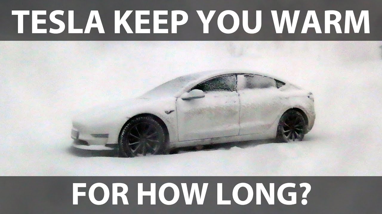 Tesla Model 3 camping in snow storm