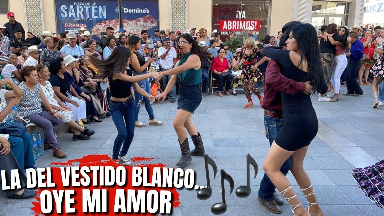 La del vestido blanco…Oye mi amor 🎶