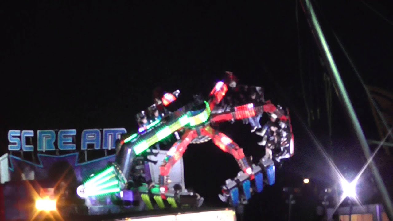 Colourful funfair rides Midsummer Common fireworks Cambridge UK  5nov14 725pm
