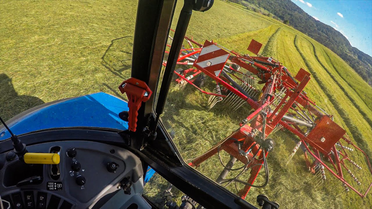 Cab View | New Holland T5 95 + SIP STAR 850 | Raking Grass